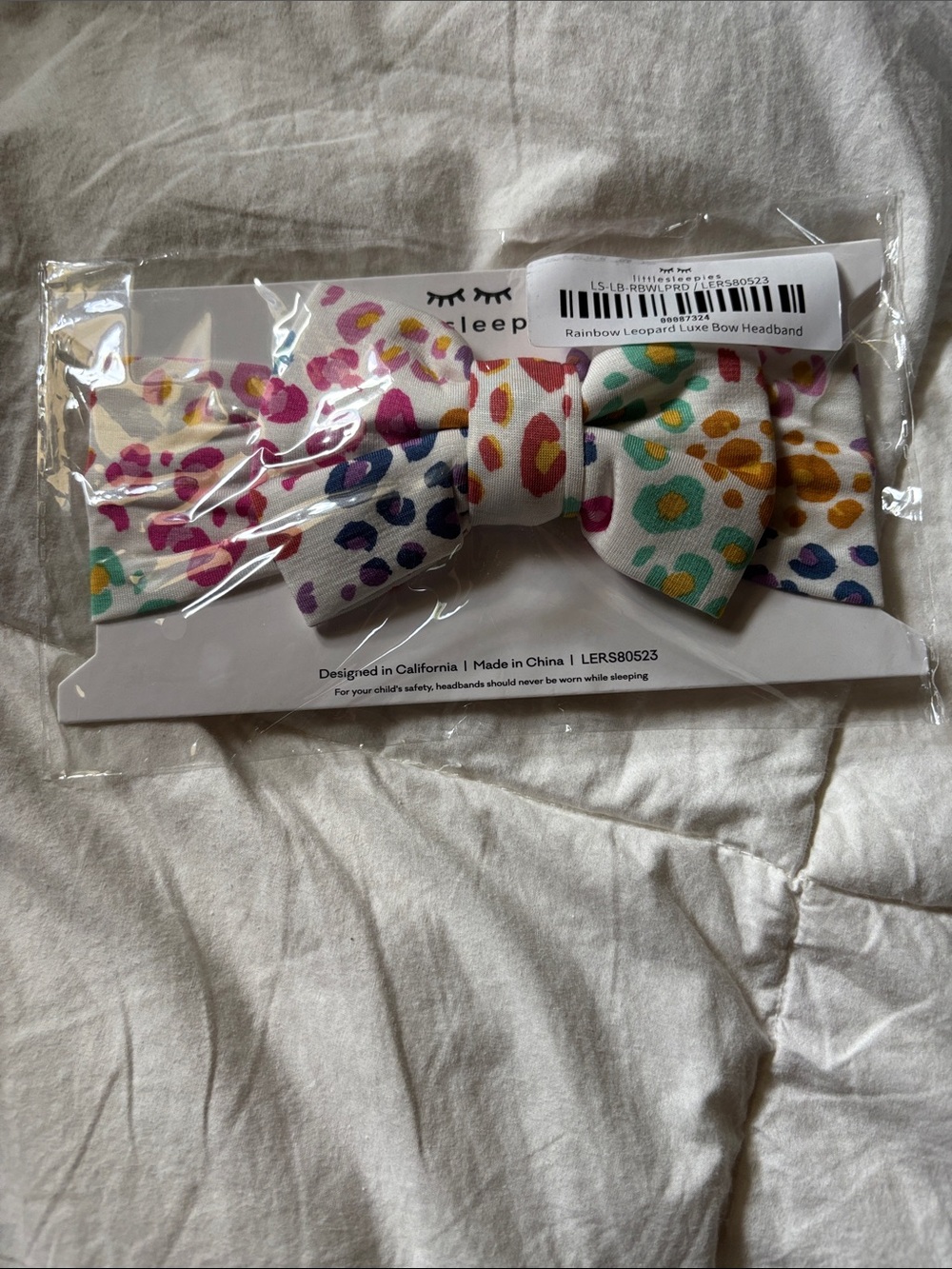 Little Sleepies White Bow Headband with Rainbow Leopard Spots